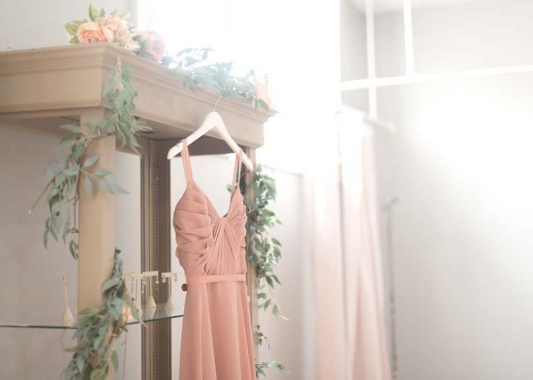 Twirl bridesmaid gowns displayed on hangers