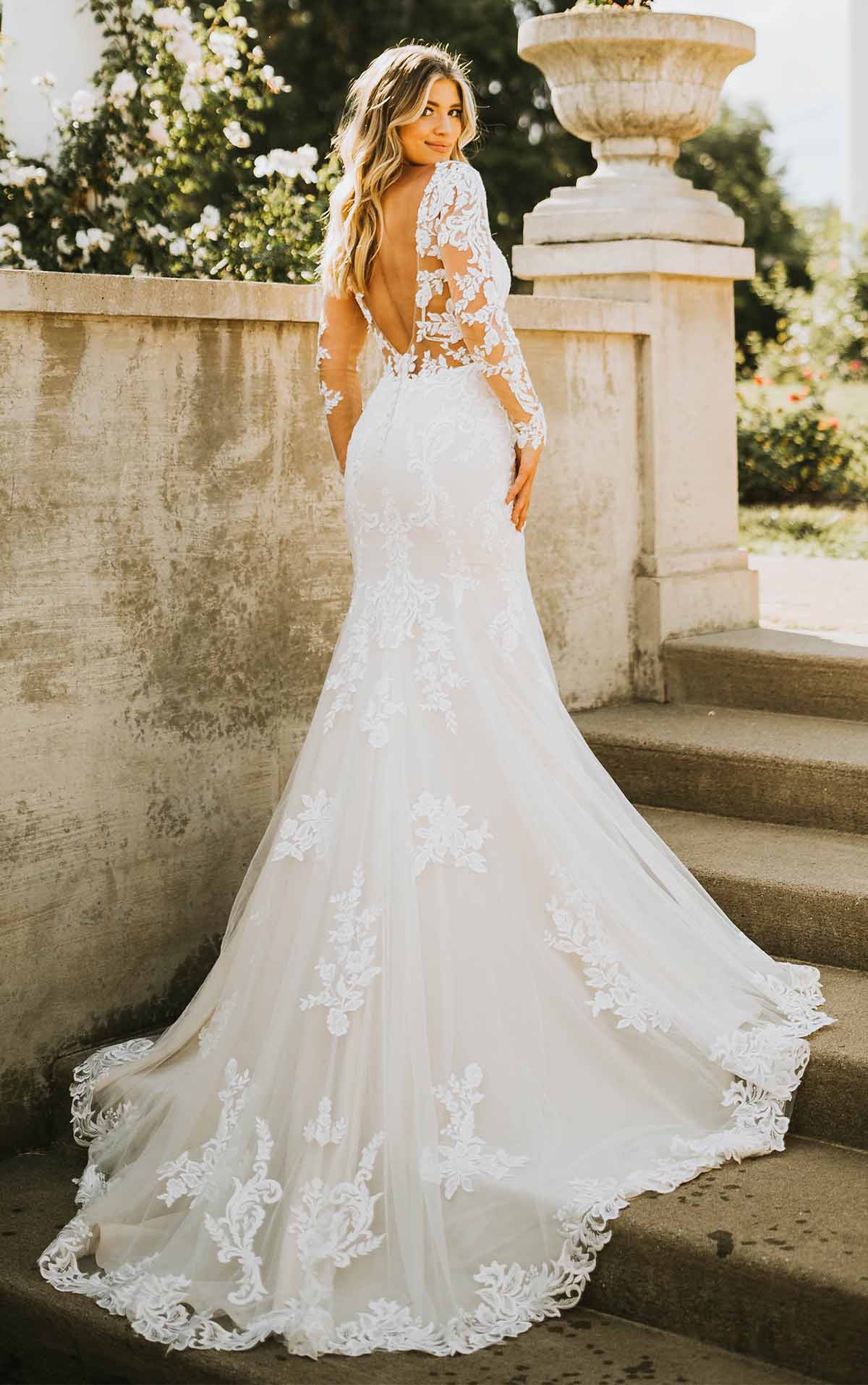 Stella York wedding dress with low back and long sleeves