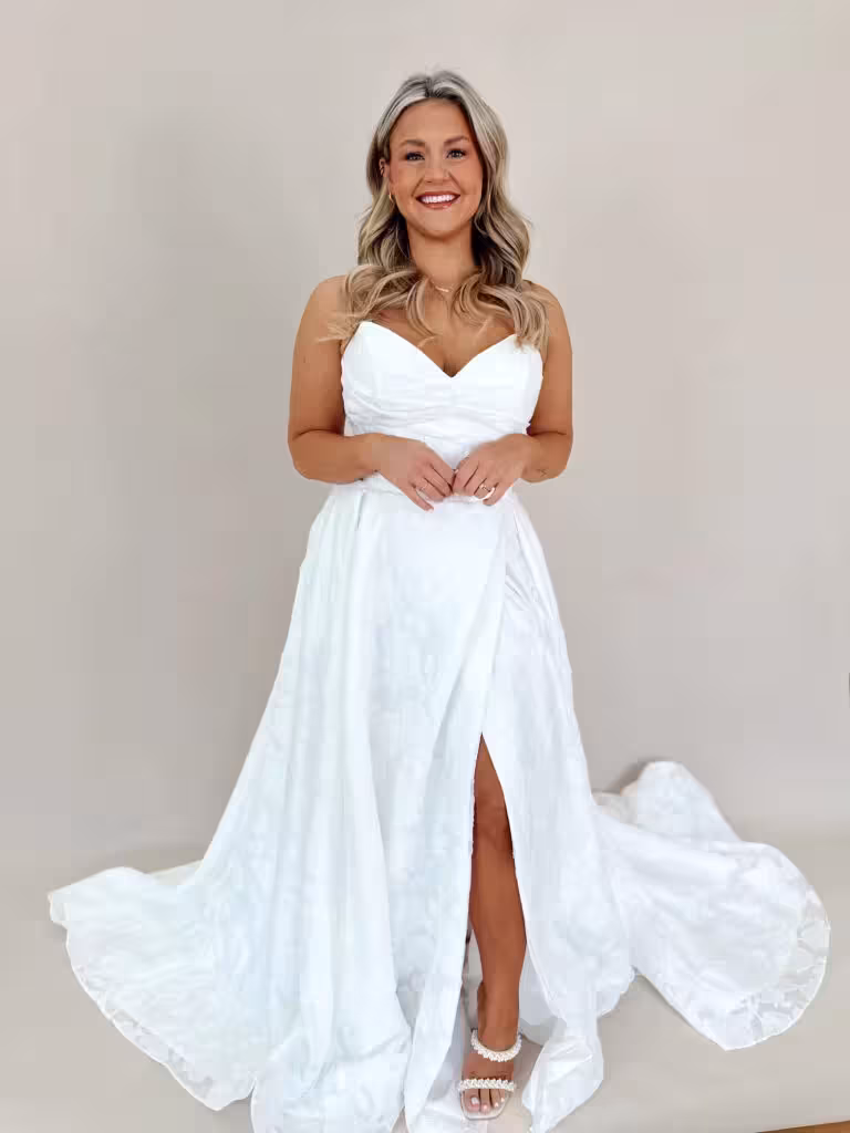 Lucca Ray Collection strapless A-line wedding dress with sweetheart neckline and high slit